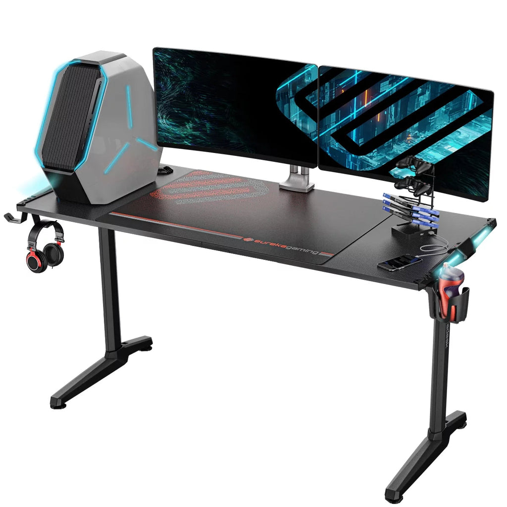 Gaming computer desk with RGB lights glowing in a dark room, dual monitors and headset on display